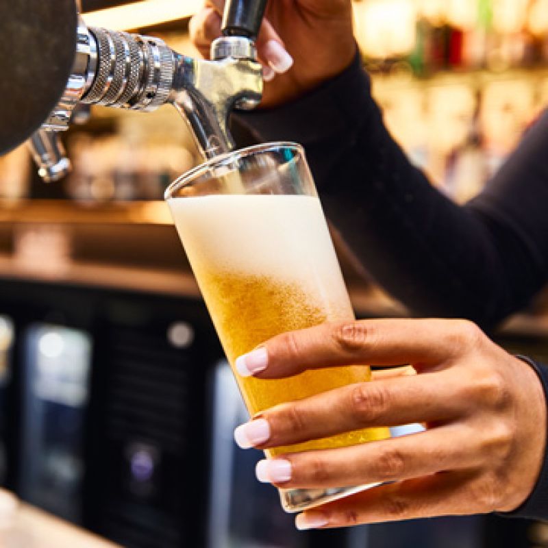 Glass of Pinot being poured